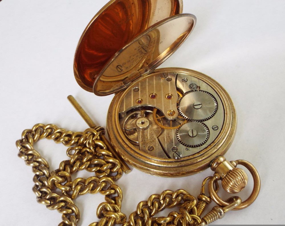 A 1930s gold plated pocket watch and chain View IV