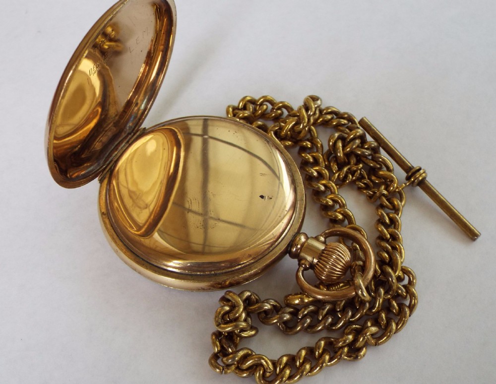 A 1930s gold plated pocket watch and chain View V