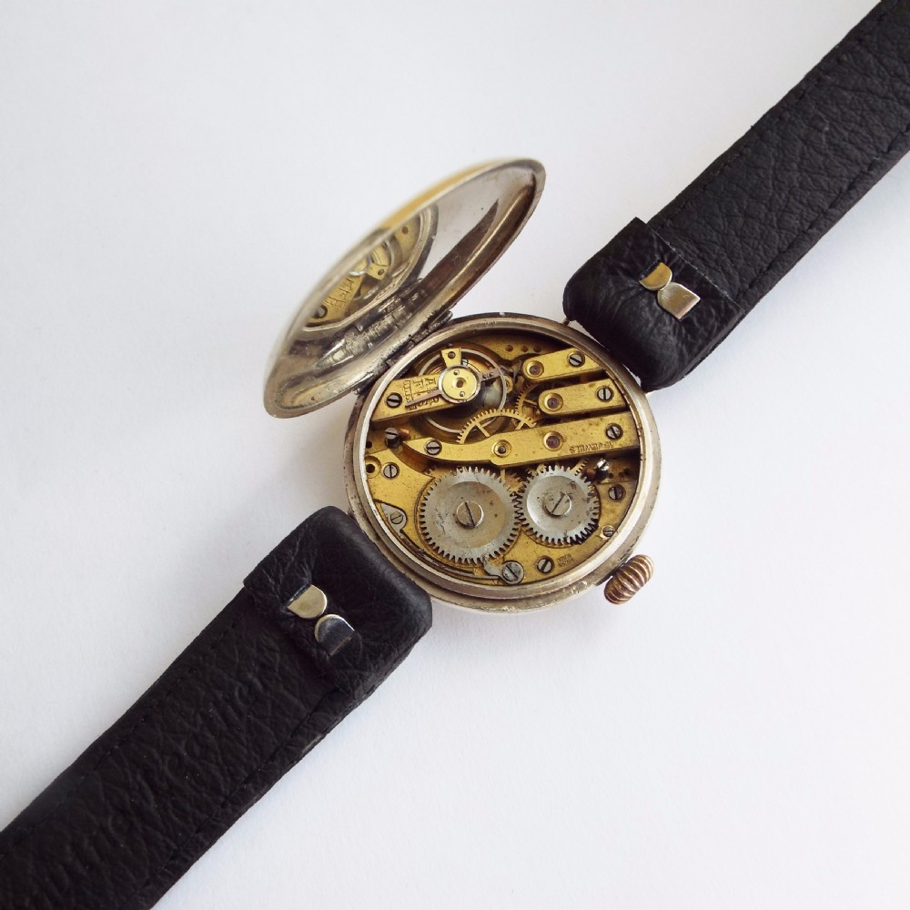 A gents 1915 silver trench watch View III