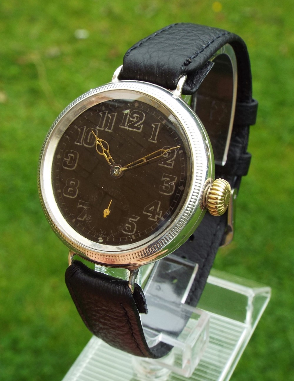 A gents 1914 silver Electa trench watch
