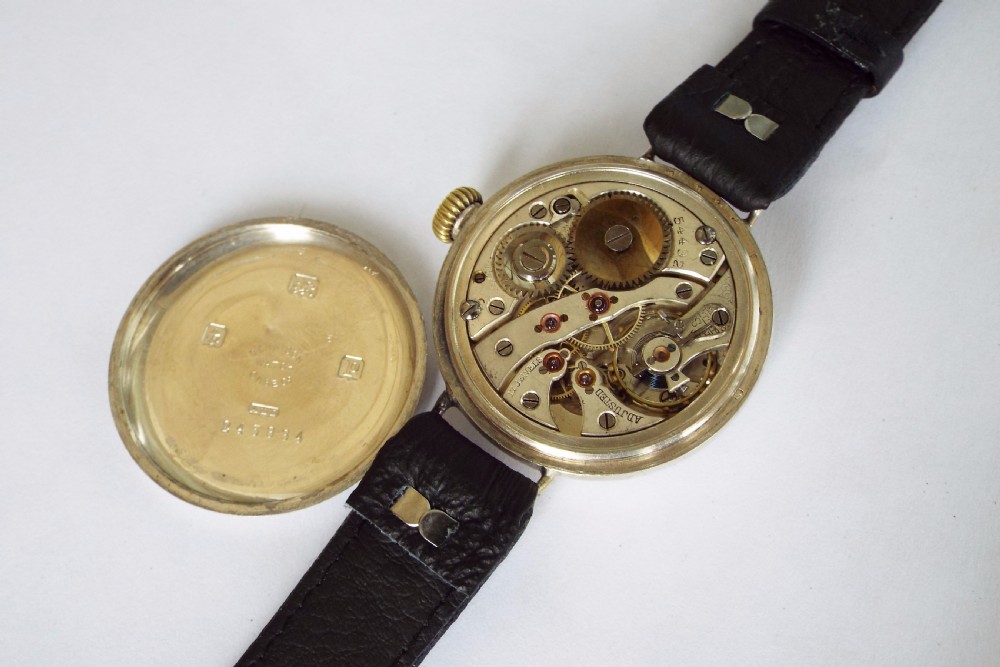 A gents 1914 silver Electa trench watch View V