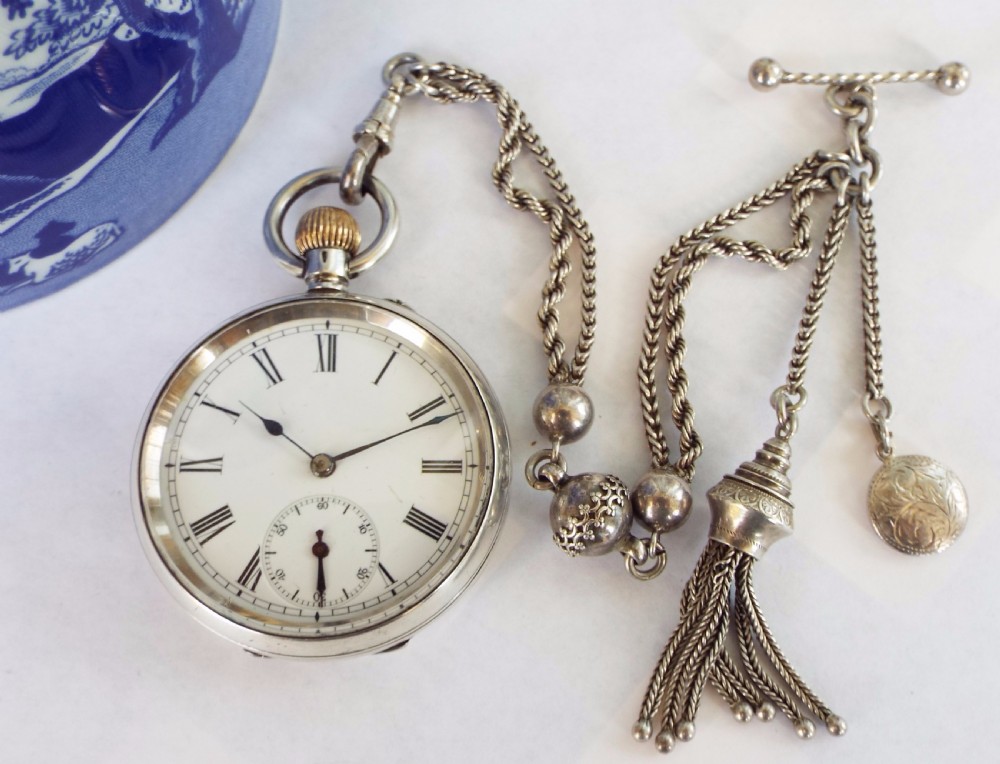 Small antique Swiss silver pocket watch and albertina View II