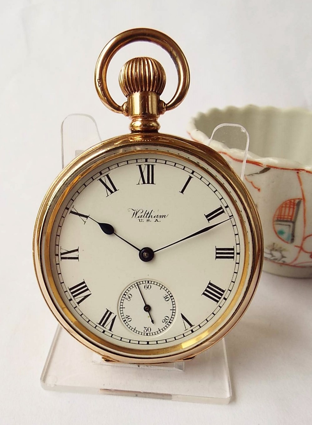 An antique Waltham Traveler pocket watch, 1918.