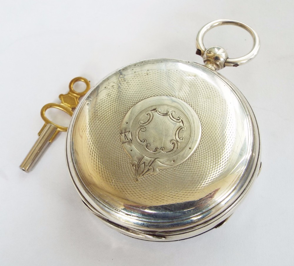 An antique English silver pocket watch, 1886 View II