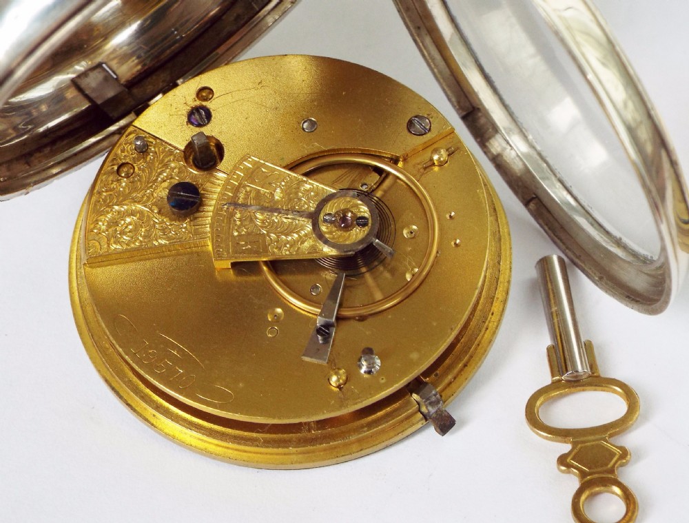 An antique English silver pocket watch, 1886 View VI