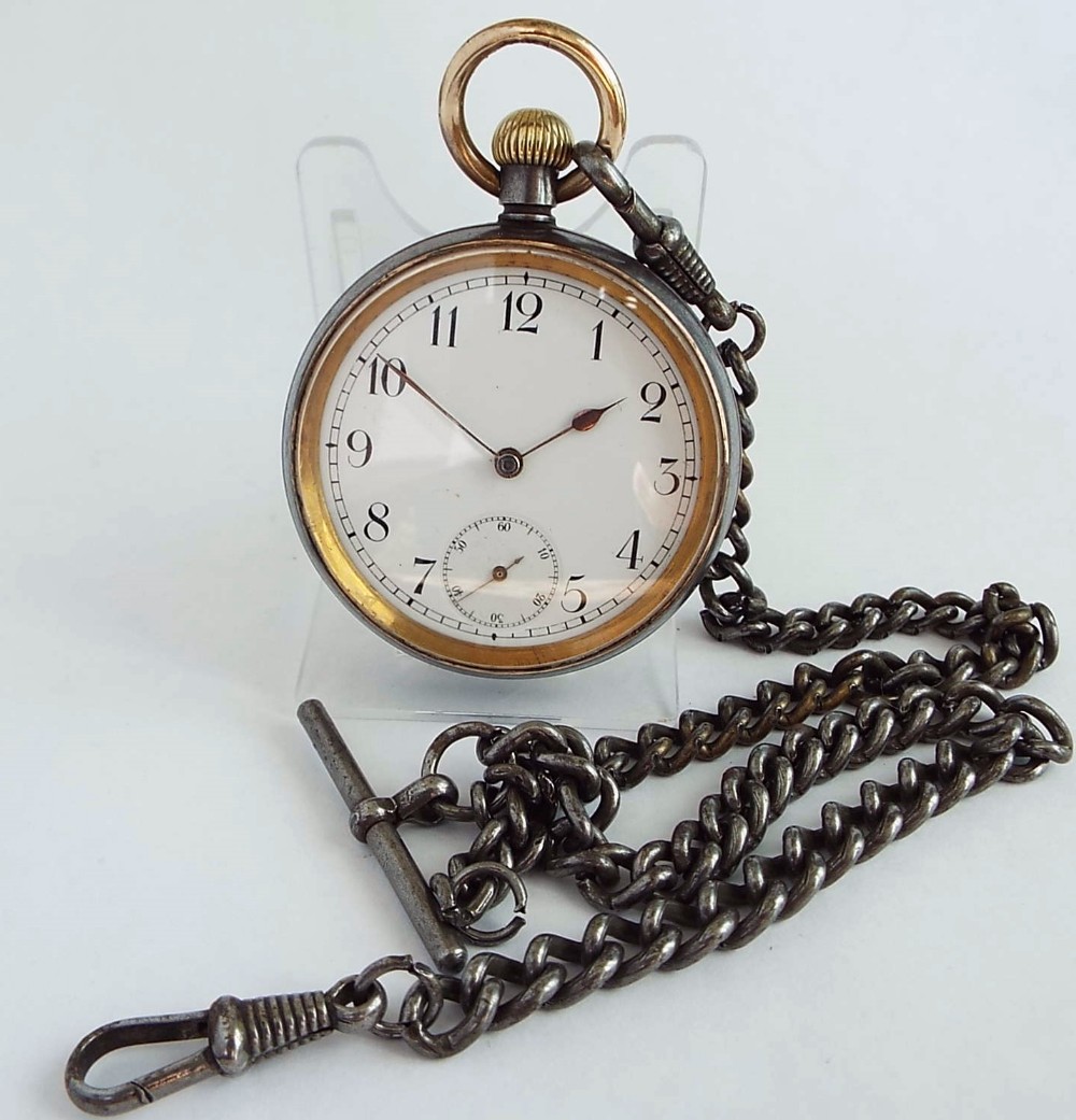 Antique gun metal Omega pocket watch & chain. Circa 1900