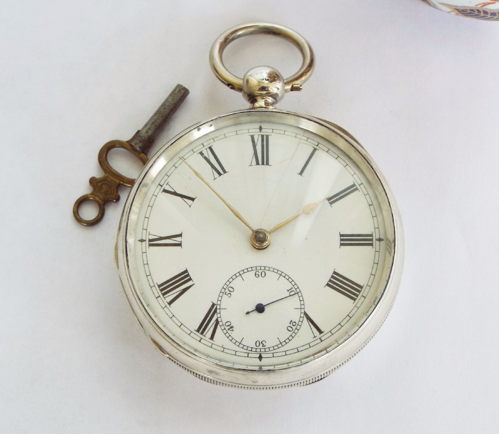 An antique silver Waltham pocket watch, 1887 View II