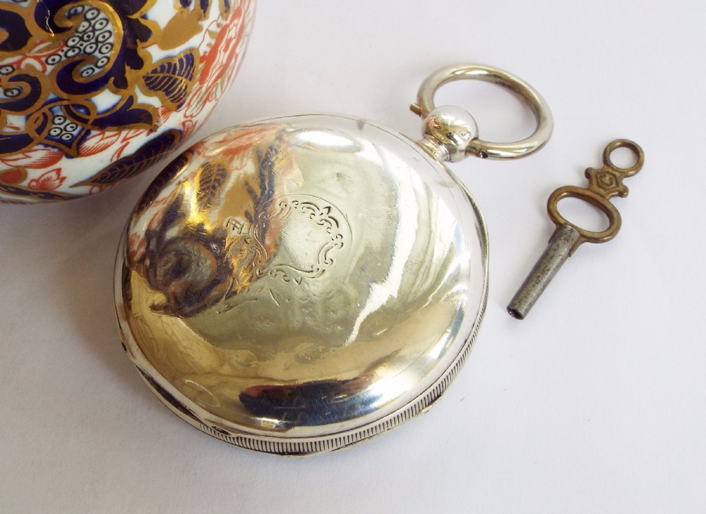 An antique silver Waltham pocket watch, 1887 View V