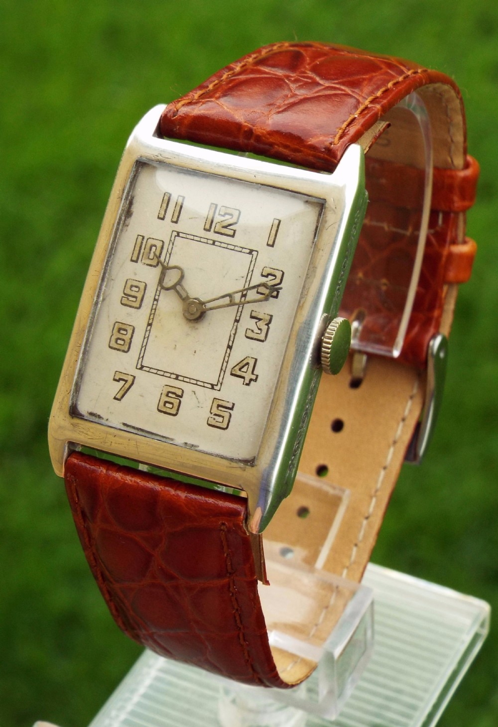 A gents 1934 silver Lurex wrist watch