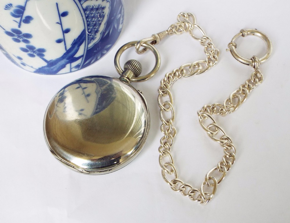 An antique 1908 Eterna pocket watch with chain View III