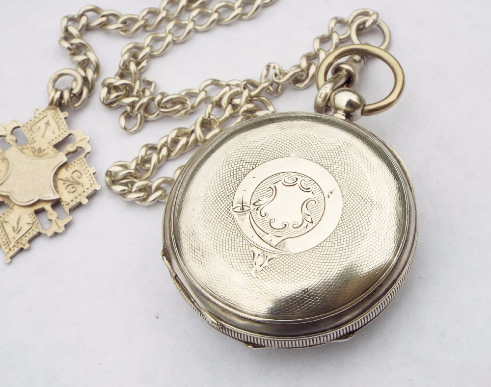 Antique Waltham silver pocket watch with chain View V