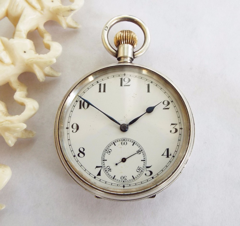 An antique silver pocket watch, 1917 View II