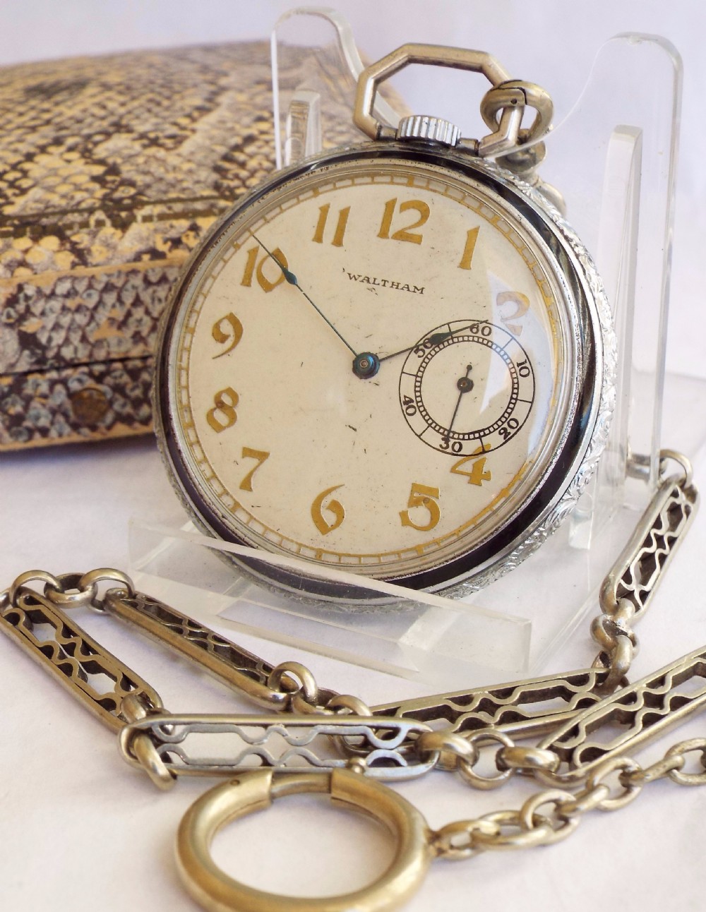 A Waltham pocket watch, 1909, with chain View II
