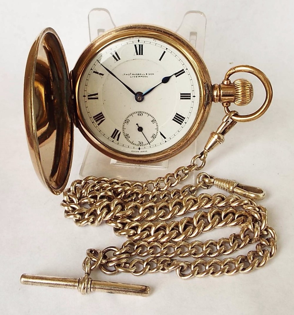 A 1930s Thomas Russell full hunter pocket watch.