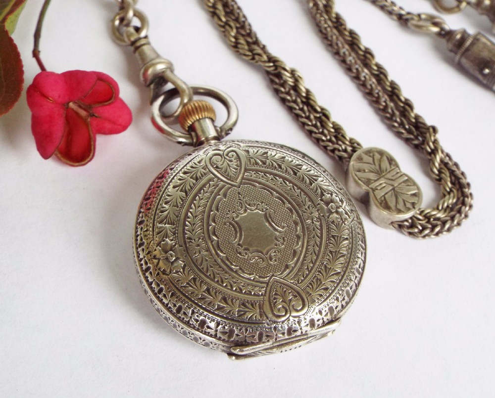 A lady’s Swiss fob watch with albertina, c1900 View IV