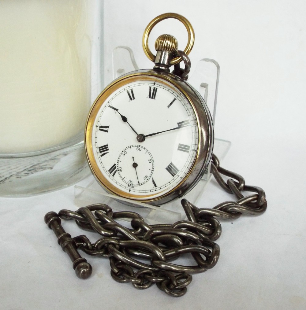 Antique gun metal pocket watch with albert