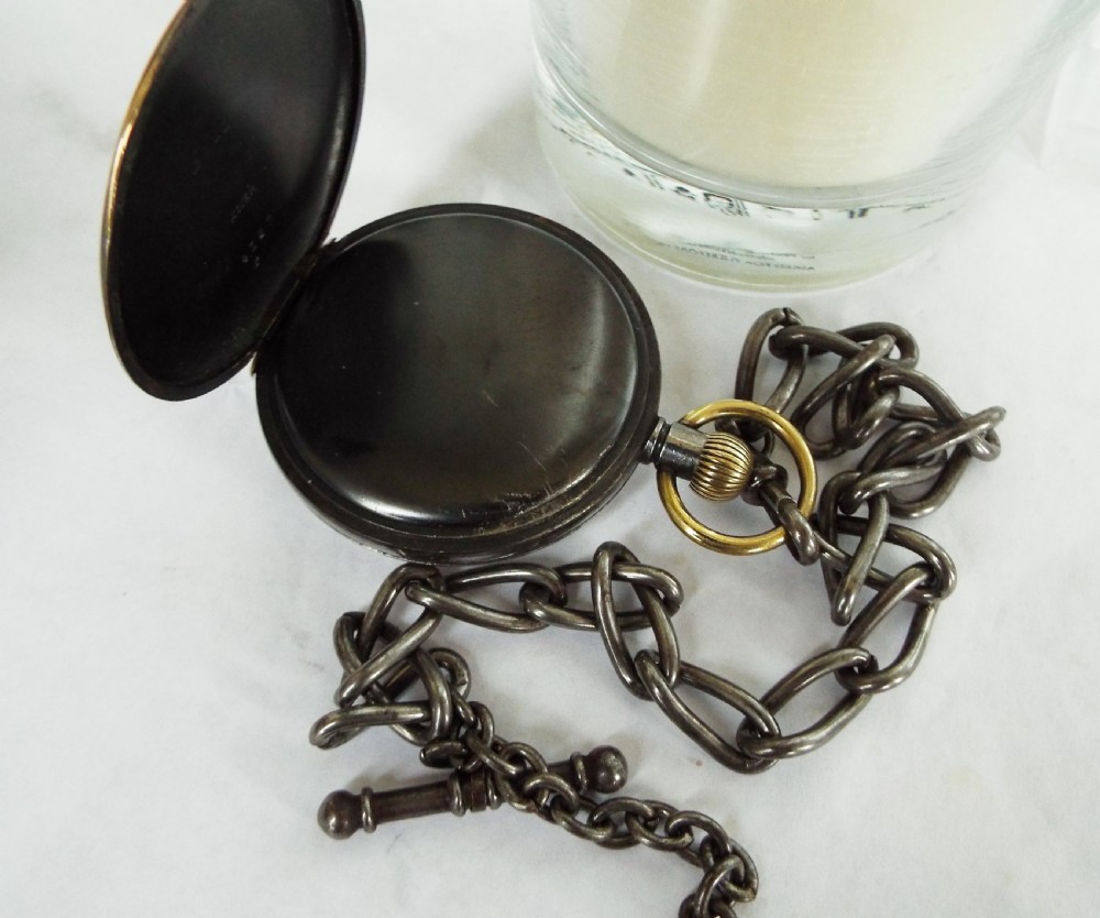 Antique gun metal pocket watch with albert View III