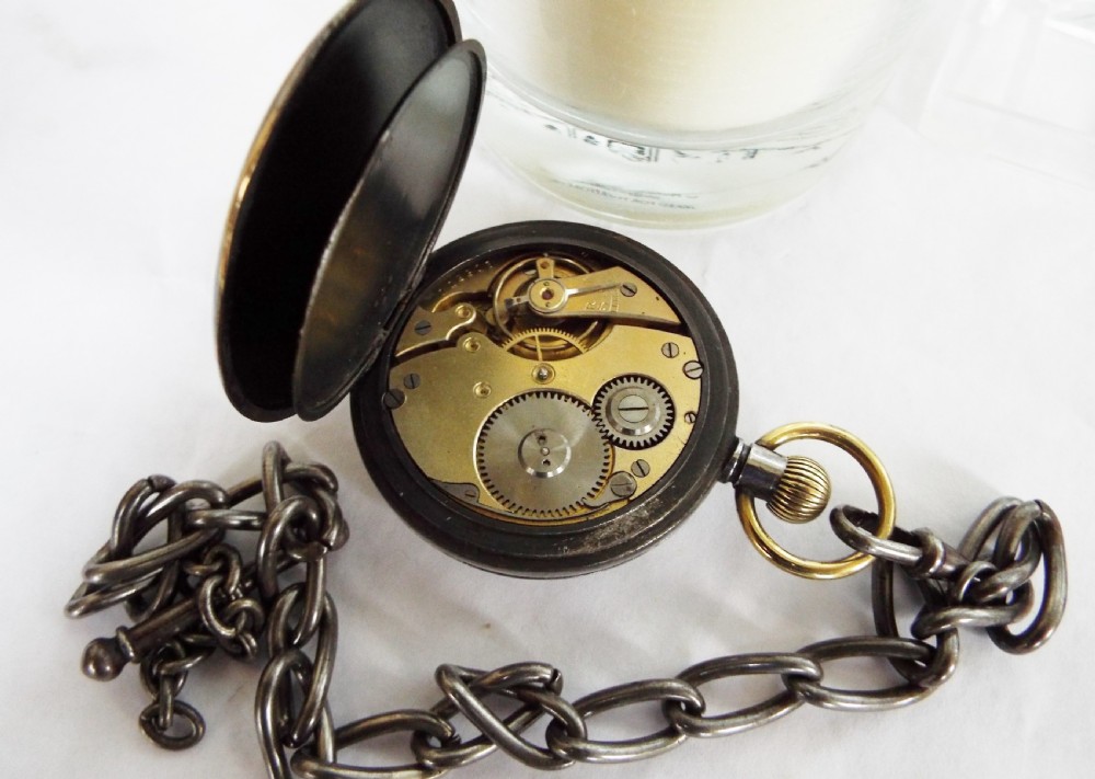 Antique gun metal pocket watch with albert View IV