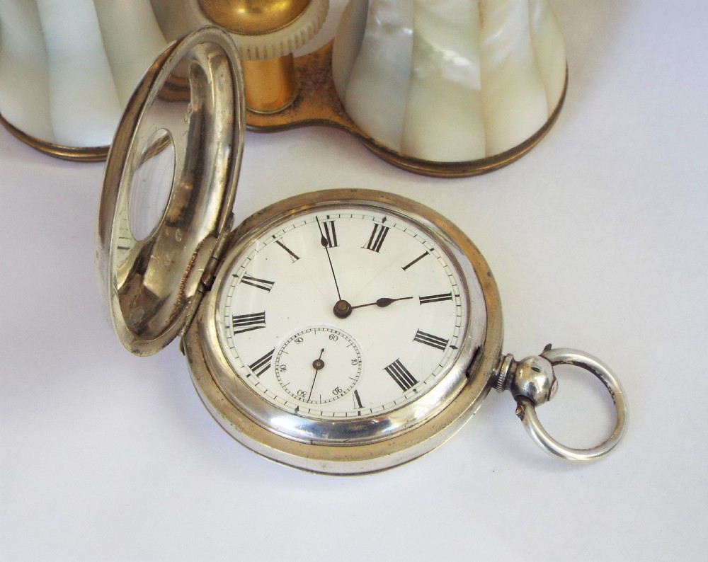 An antique silver half hunter pocket watch View II