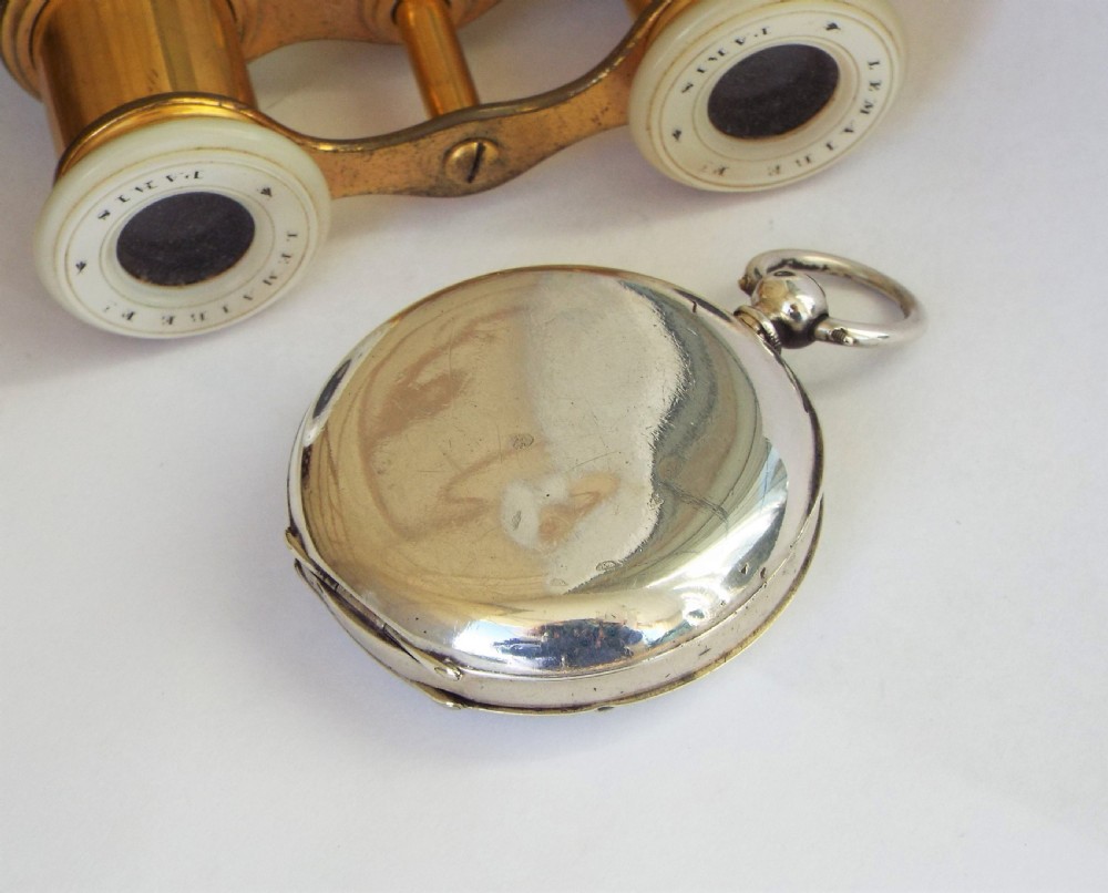 An antique silver half hunter pocket watch View V