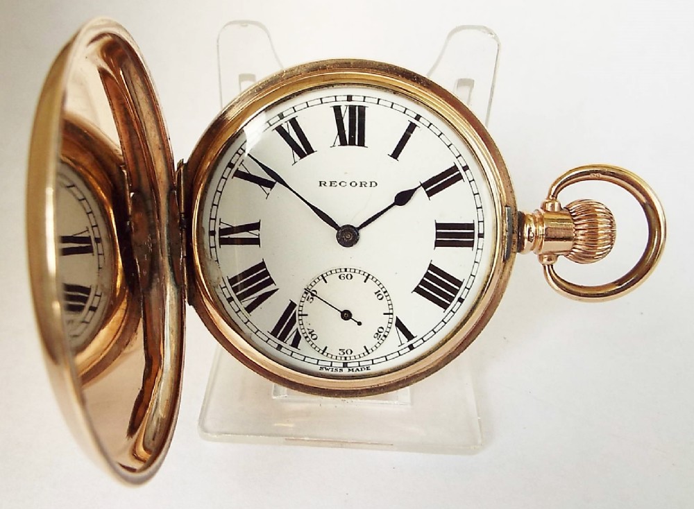 A 1920s Record full hunter pocket watch.