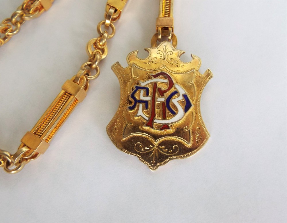 Edwardian watch albert and silver gilt fob View II