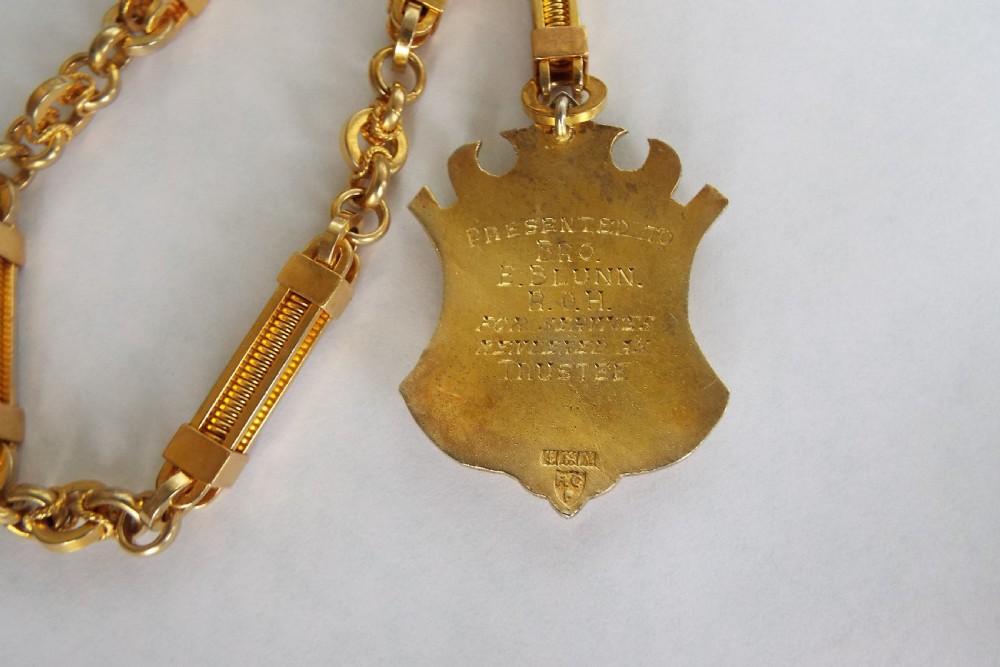 Edwardian watch albert and silver gilt fob View III