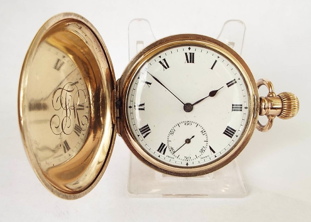 An antique Swiss full hunter pocket watch.