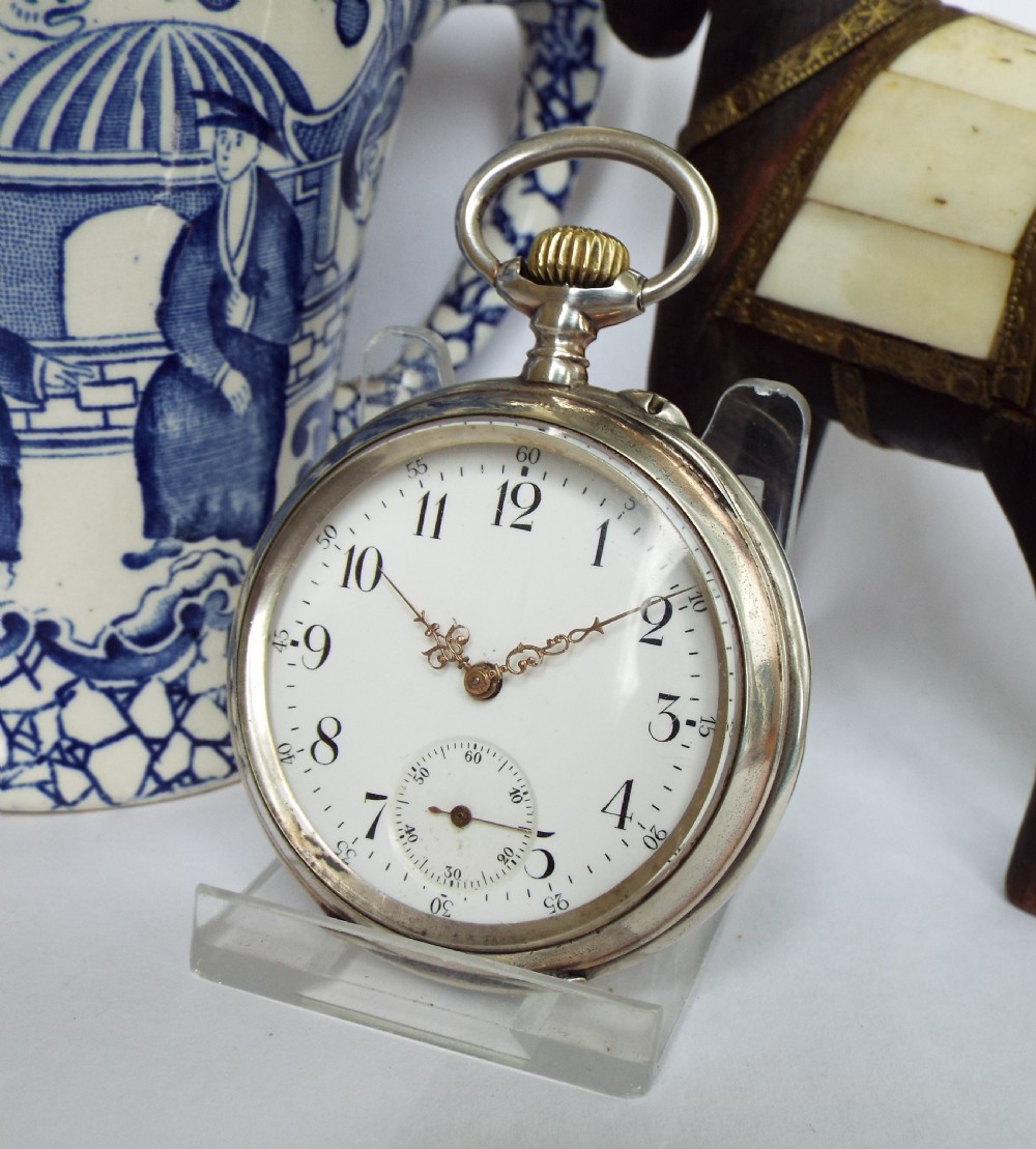 An antique silver pocket watch, c1910s