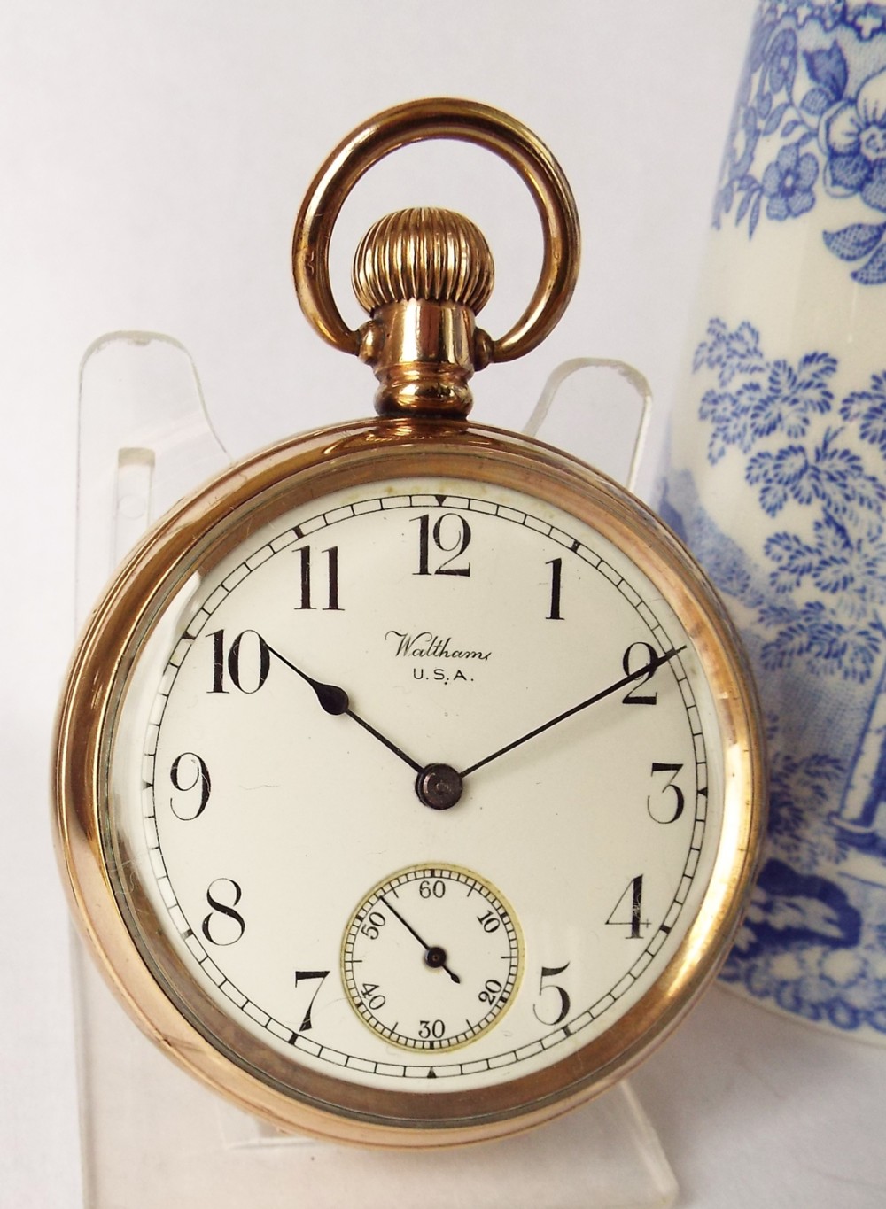 A 1920s Waltham Traveler pocket watch.