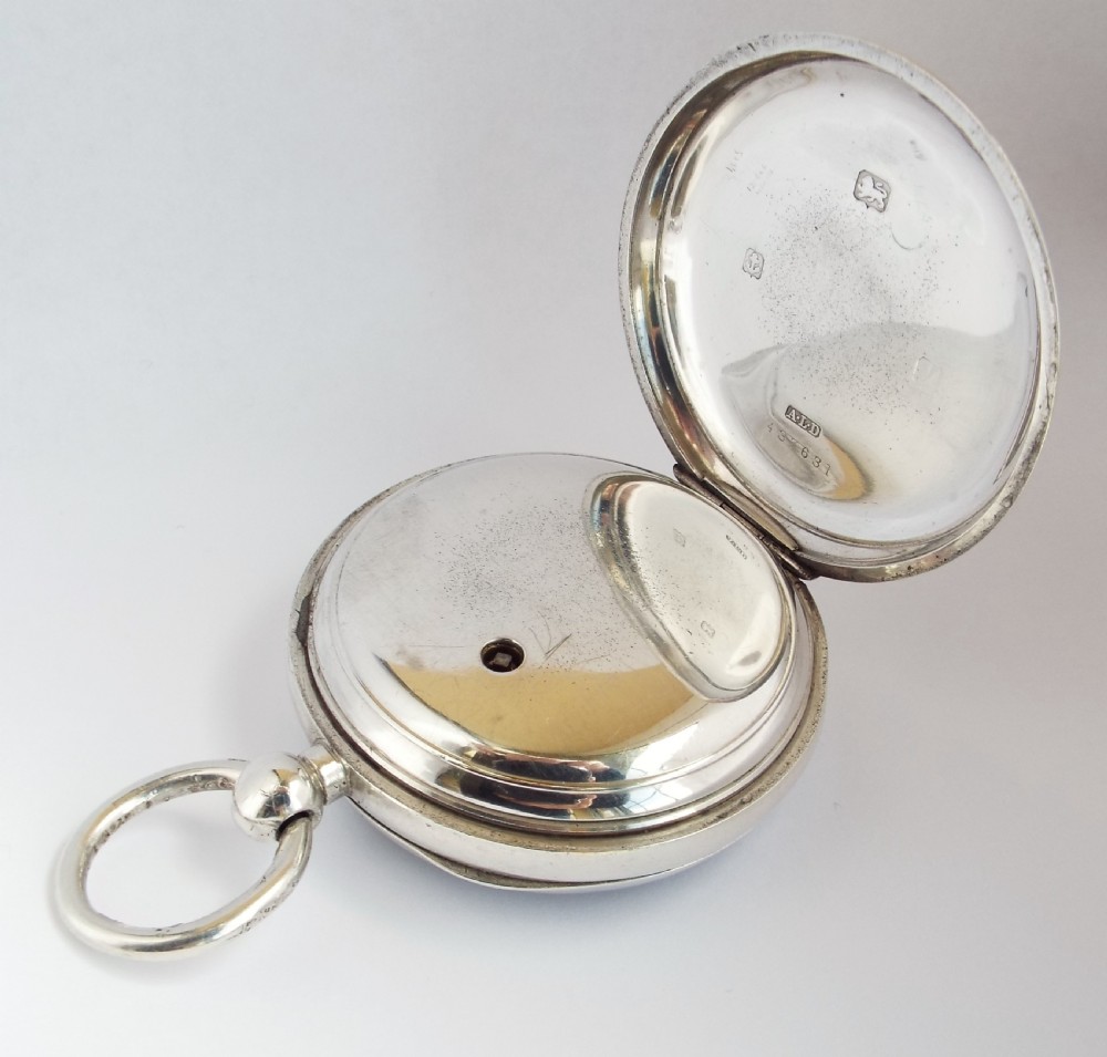 An antique silver Waltham pocket watch. View III