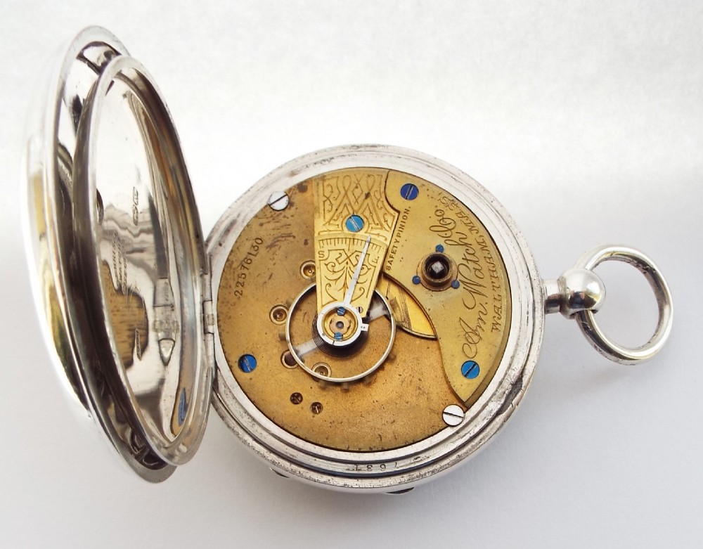 An antique silver Waltham pocket watch. View V