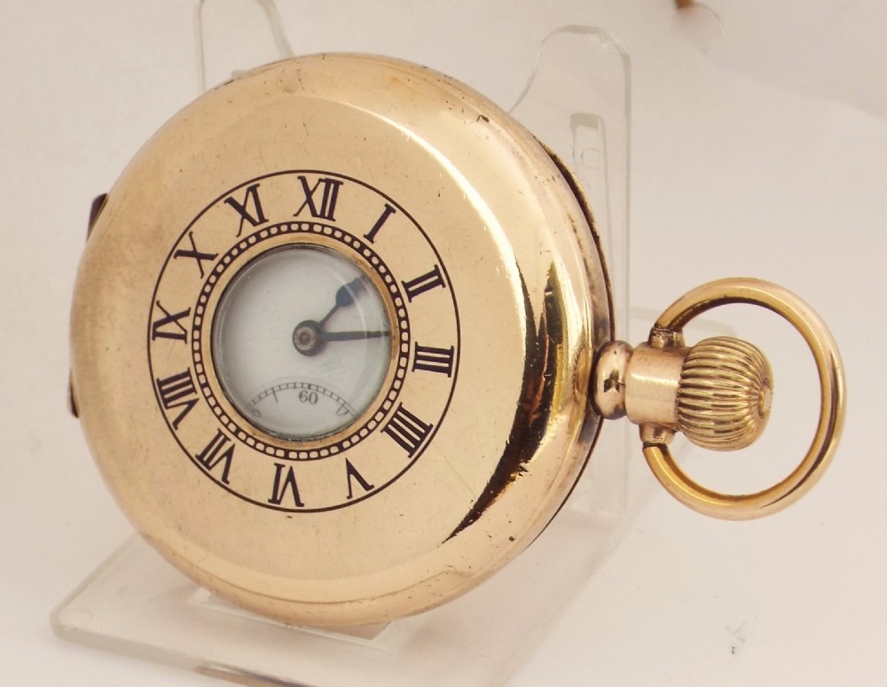 A 1920s Cyma half hunter pocket watch.