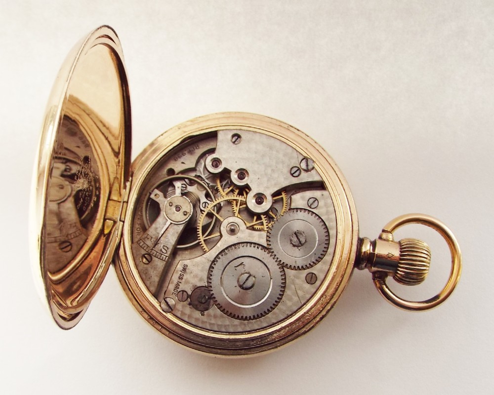A 1920s Cyma half hunter pocket watch. View V
