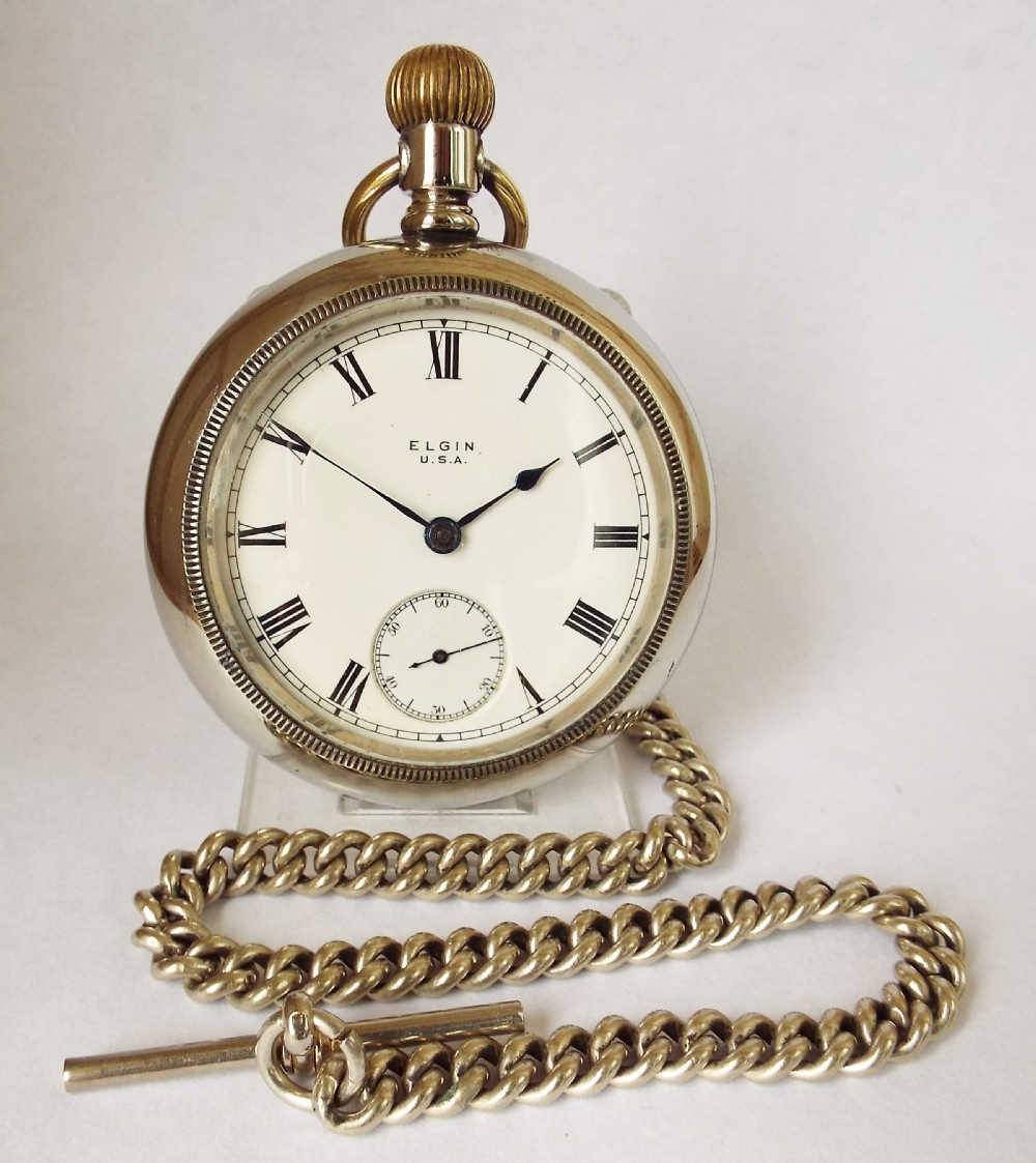 A large 1919 Elgin pocket watch & chain.