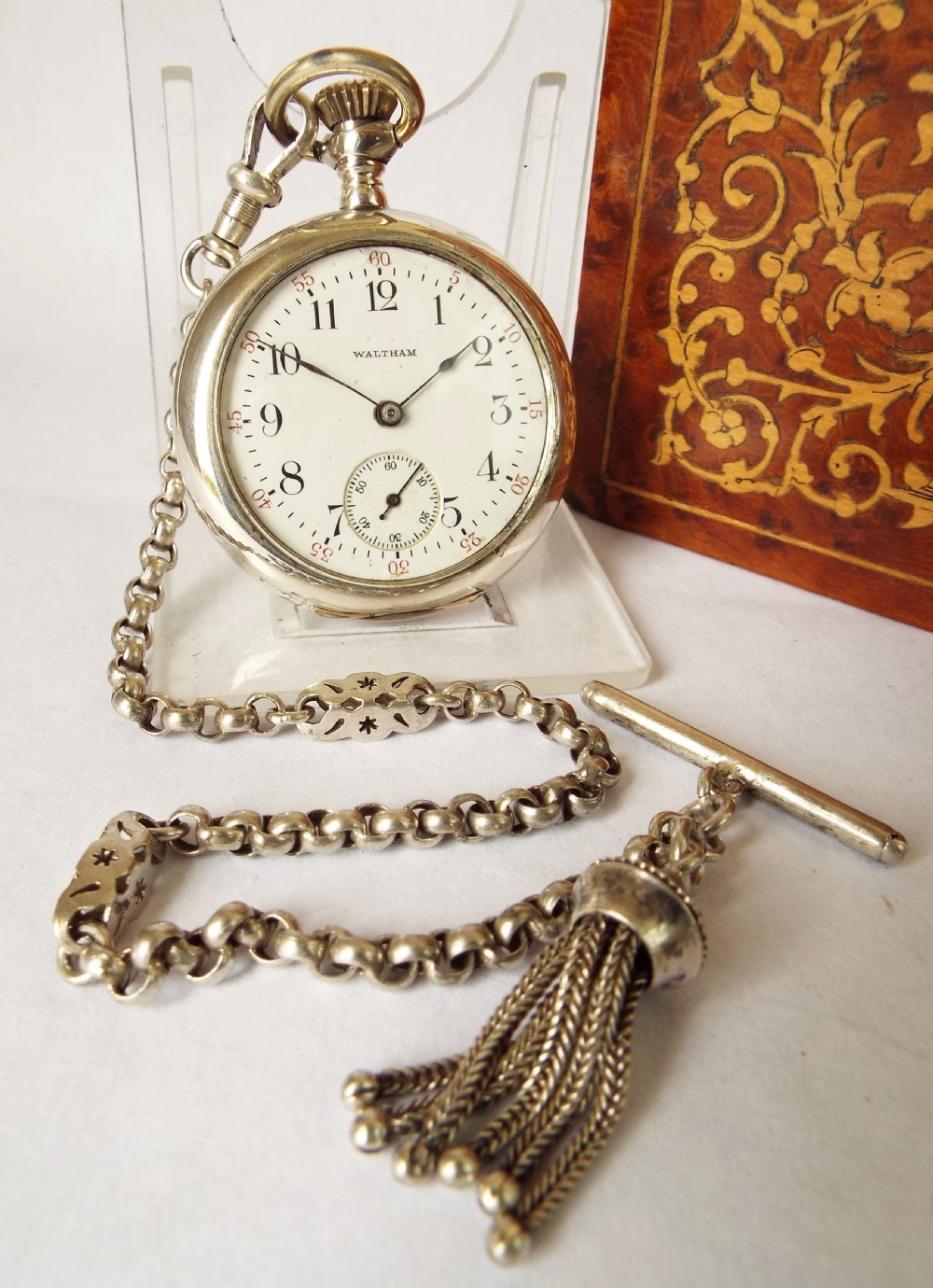 A ladies silver antique Waltham fob watch with albertina.