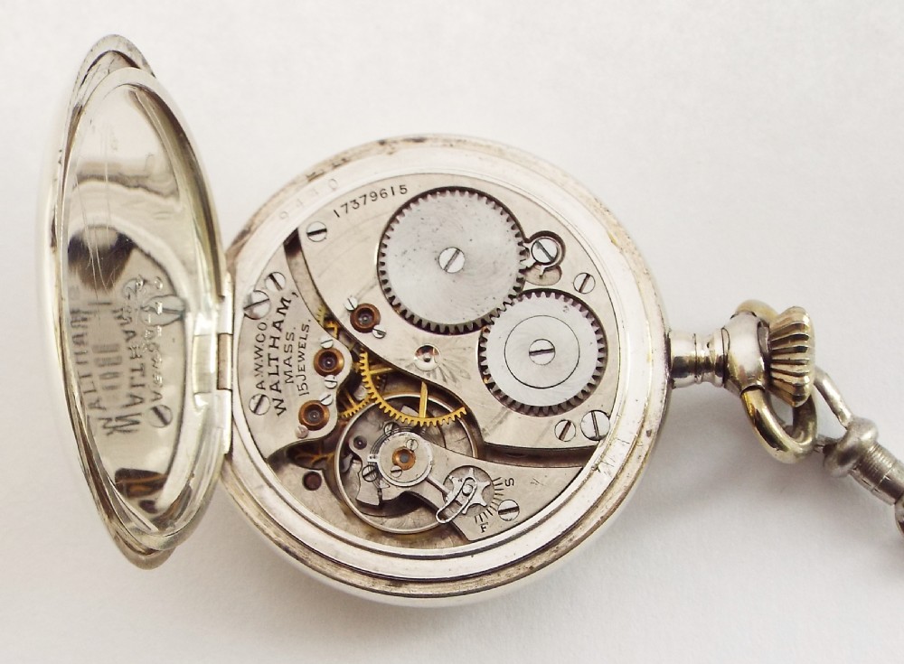 A ladies silver antique Waltham fob watch with albertina. View V
