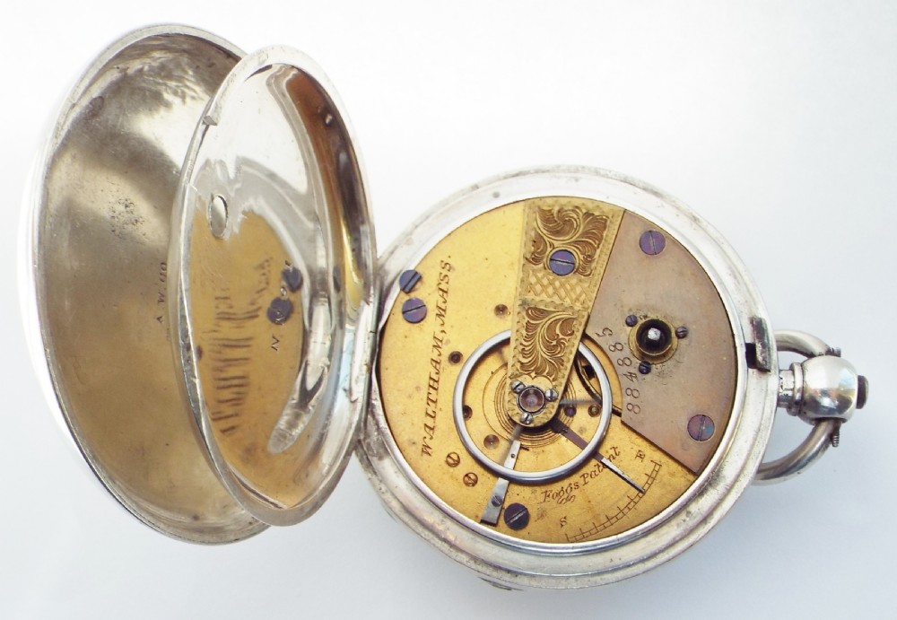 An antique 1876 silver Waltham pocket watch. View V