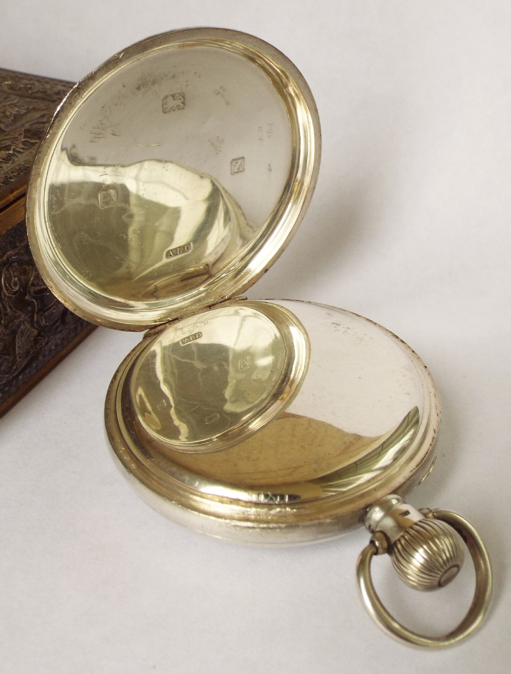 A vintage 1920s silver pocket watch by James Walker of London. View III