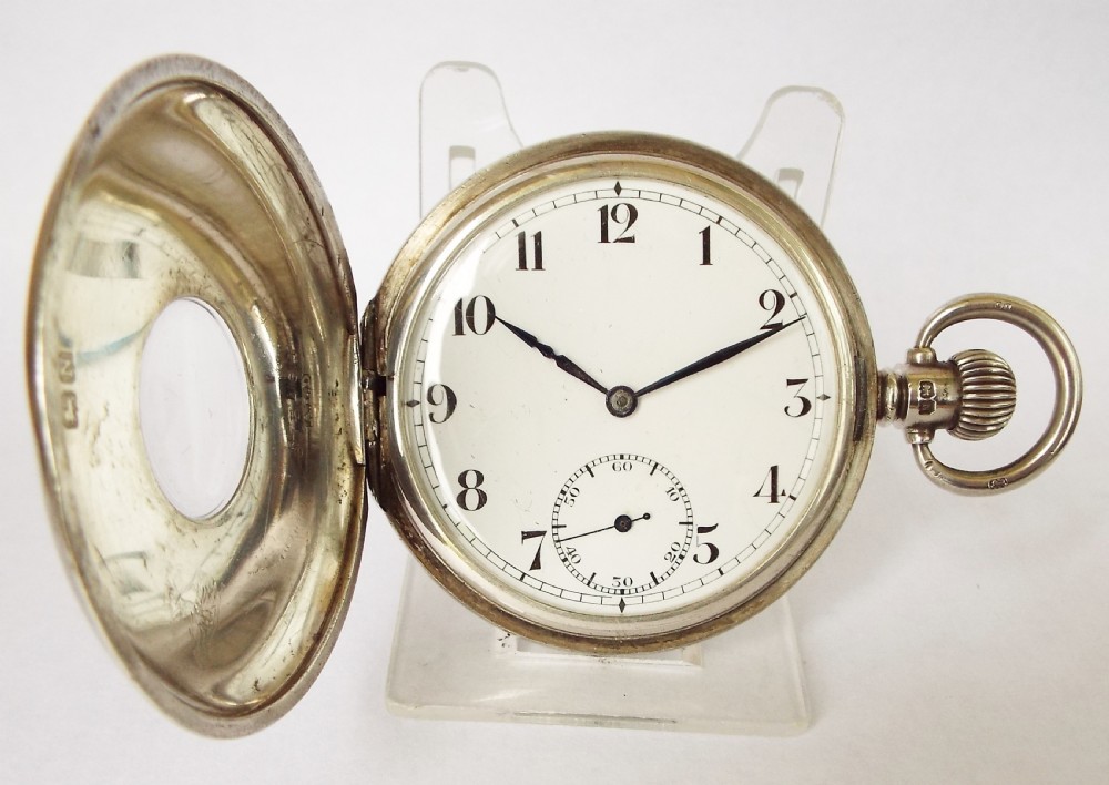 A 1930s silver half hunter Record pocket watch. View II
