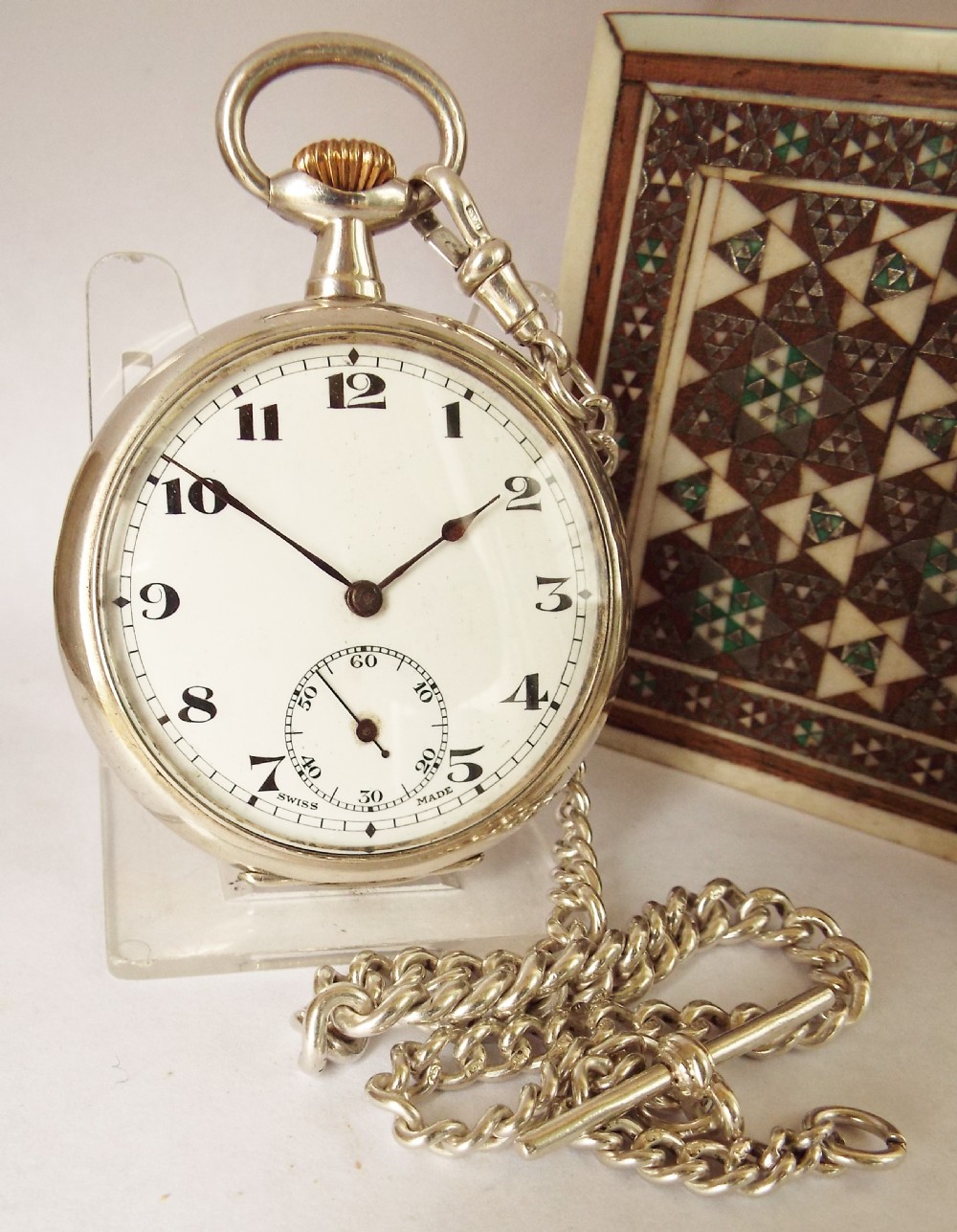 Antique silver 1919 Swiss pocket watch and chain.