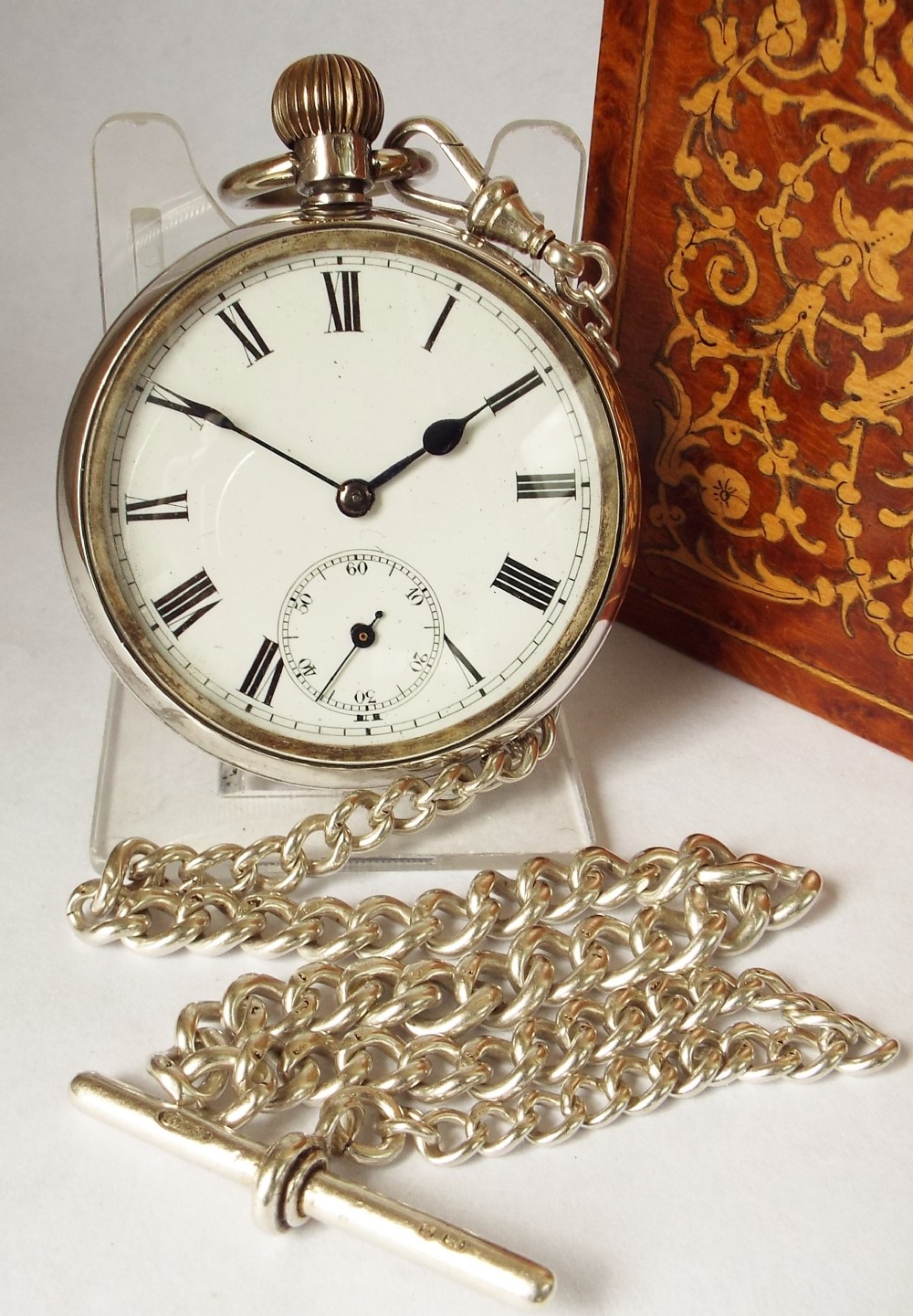 A silver 1920s Swiss pocket watch & chain.