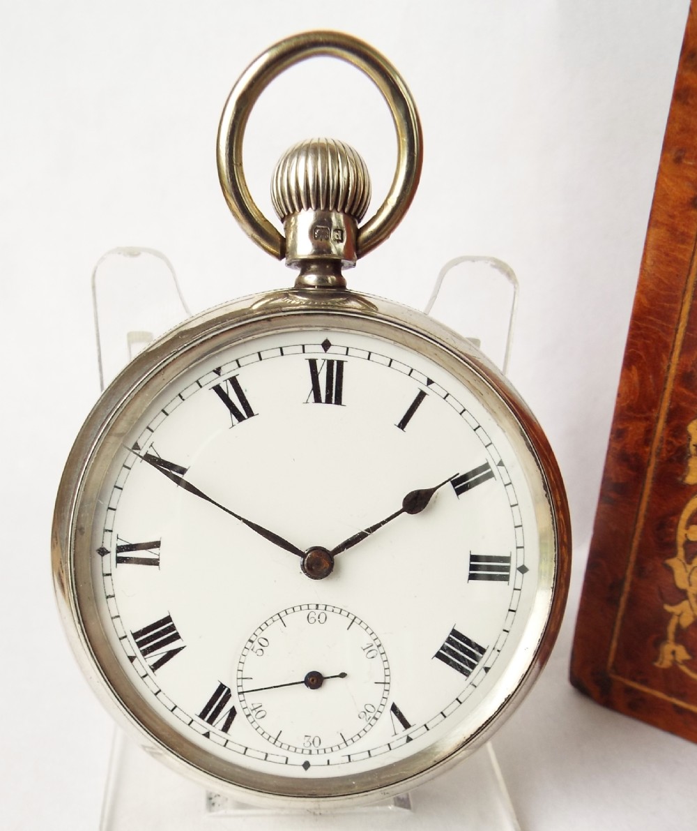 An antique silver pocket watch, 1903.