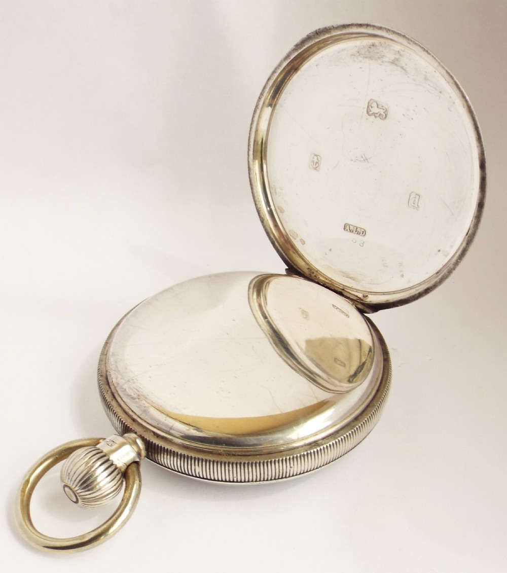 An antique silver pocket watch, 1903. View III