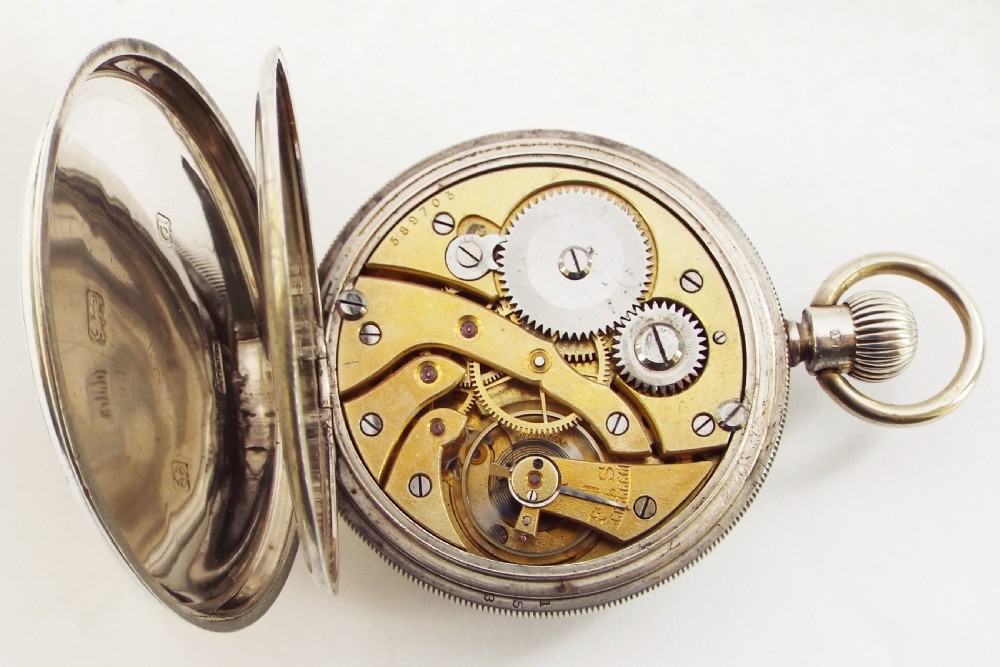 An antique silver pocket watch, 1903. View IV