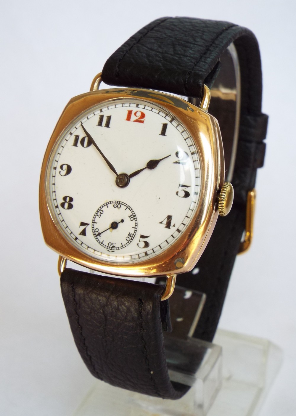 Gents 9ct rose gold cushion case wrist watch, 1929