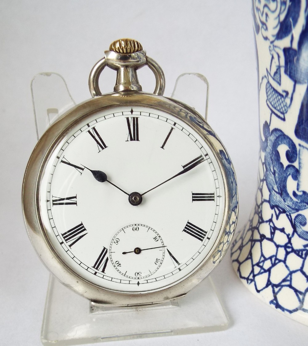 An antique silver Omega pocket watch, c1900s