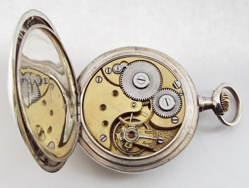 An antique silver Omega pocket watch, c1900s View V