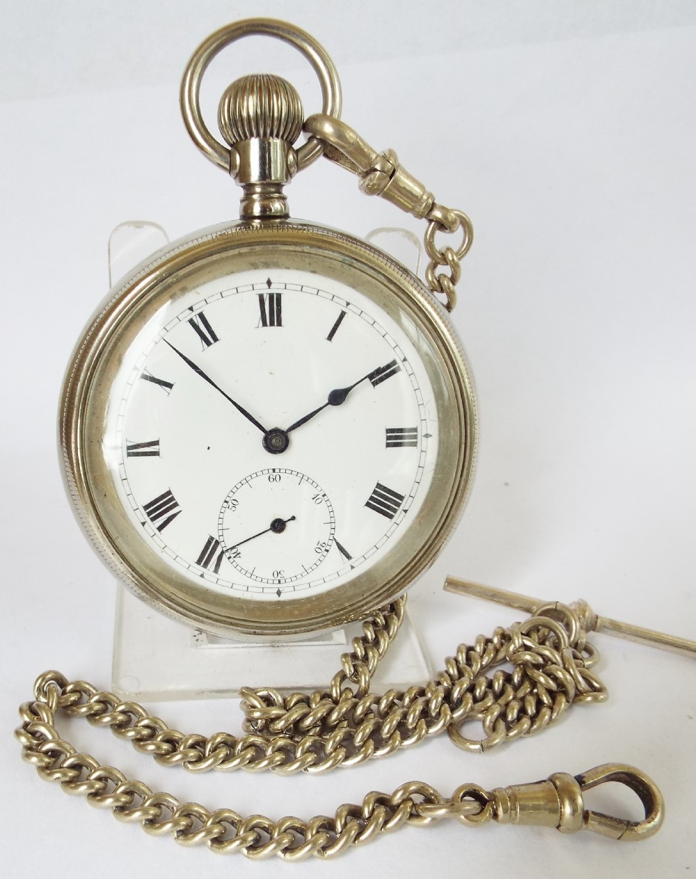 A vintage 1920s pocket watch & chain.