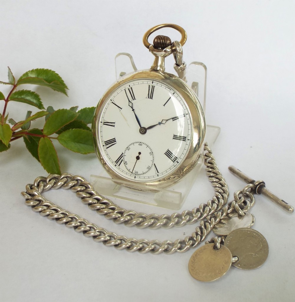 Antique silver Omega pocket watch and chain